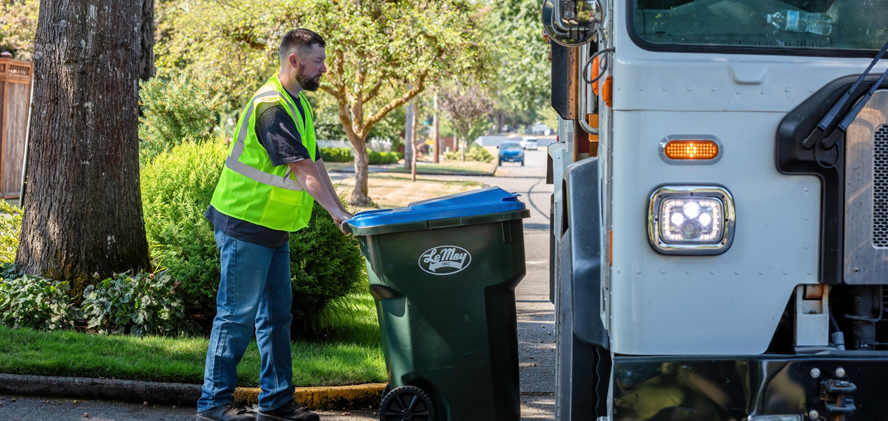 Junk removal crew collecting bulky household items