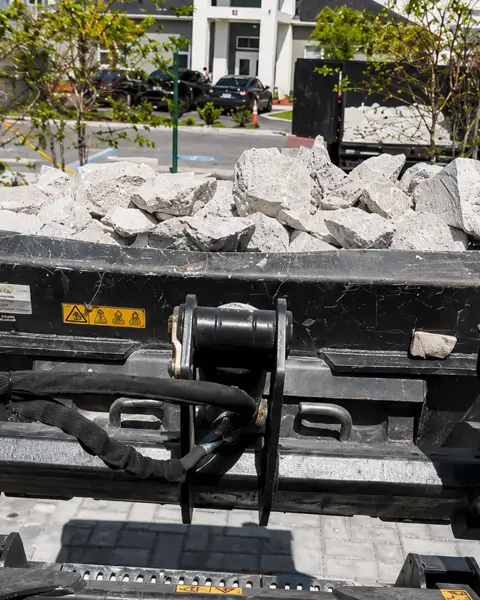 Trailer loaded with concrete and site debris