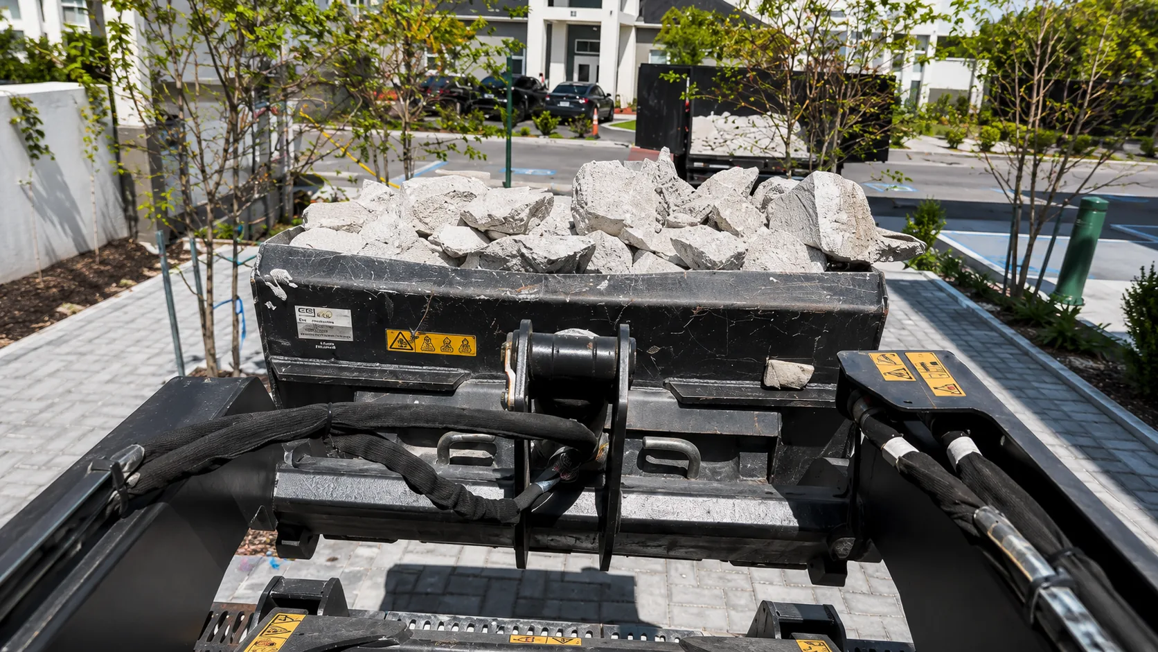 Trailer loaded with broken concrete and site debris ready to haul off